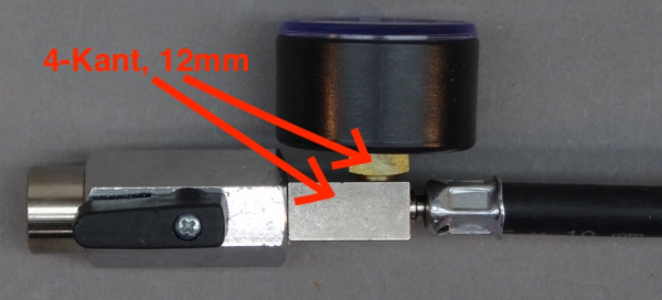 Ersatzmanometer und zwei Füllgasdosen